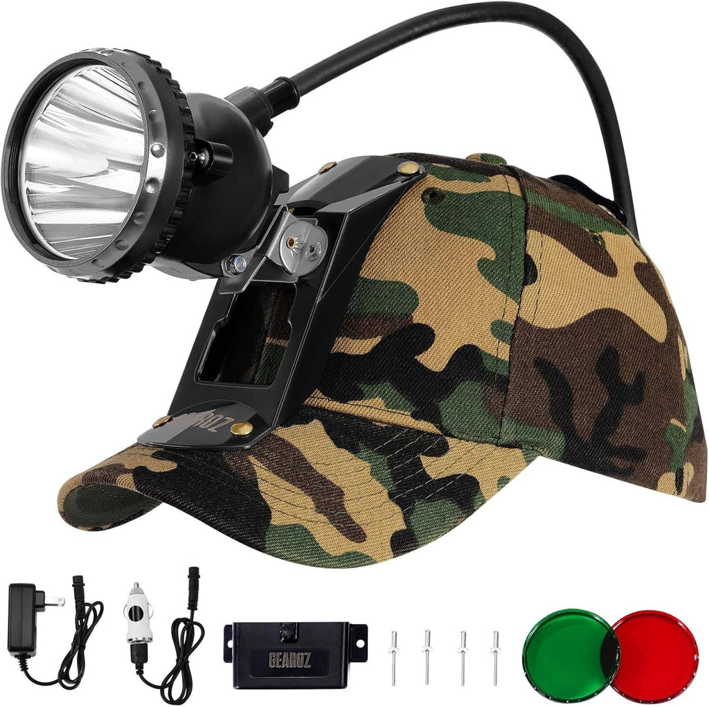 Camouflage hunting headlamp hat kit with black spotlight, battery pack, and green/red lens covers.