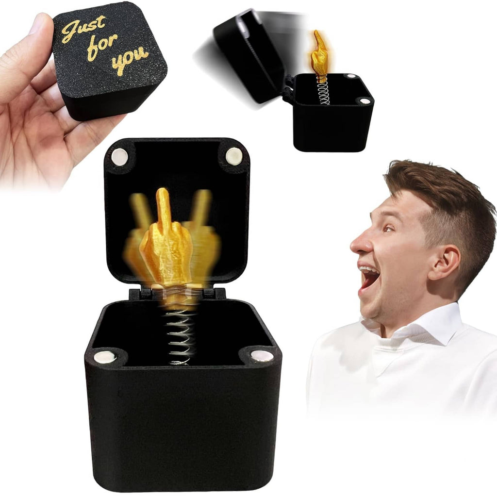 Black magnet gag gift box with gold middle-finger figure in open lid