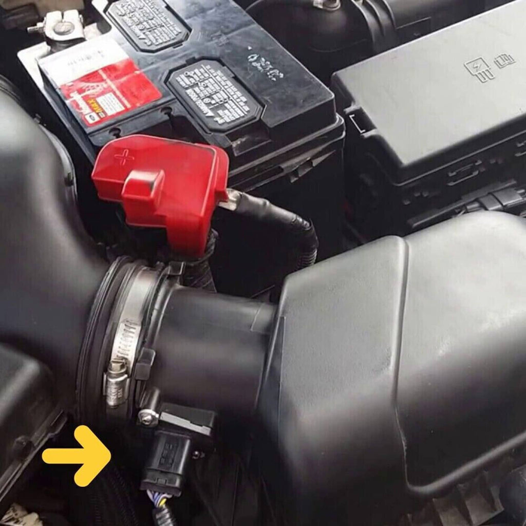 Mass air flow sensor near engine air intake tubing and control unit