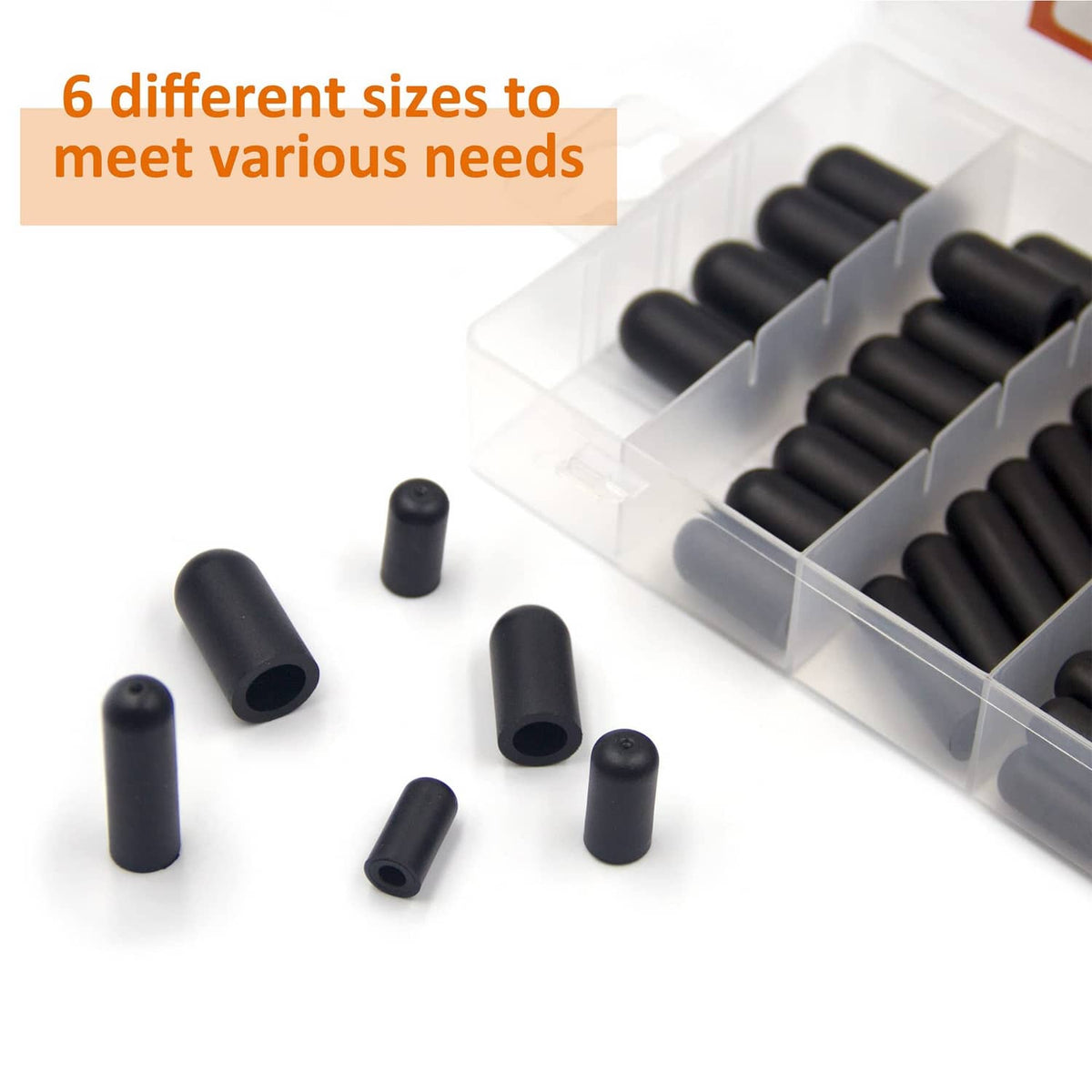 Black rubber vacuum caps in a clear compartment tray, assorted lengths