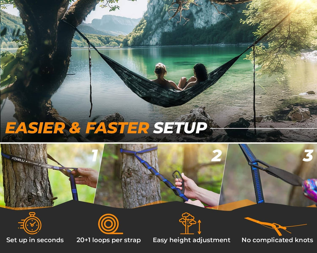 Hammock held by blue-and-black straps over a tree with adjustable loops
