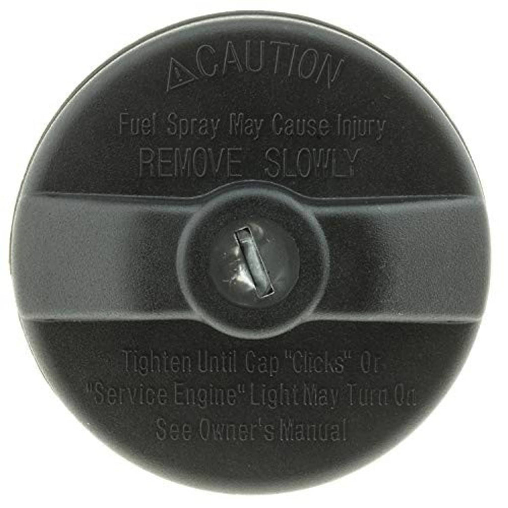 Fuel cap face with caution text and lock knob, dark gray plastic