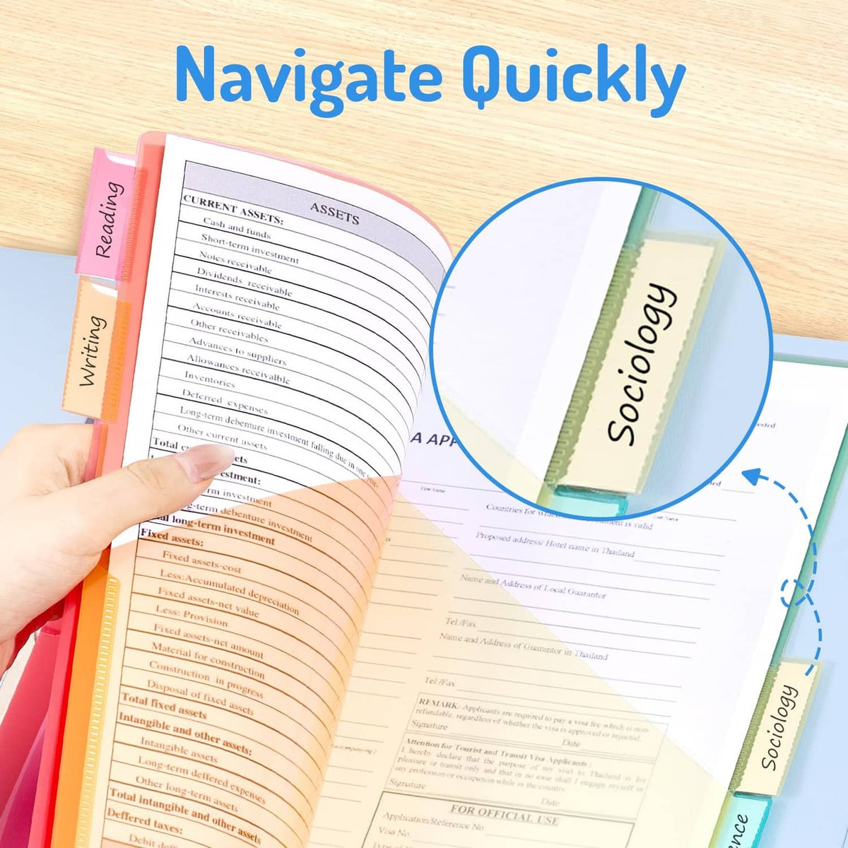 Plastic pocket divider holding planner sheets inside the binder