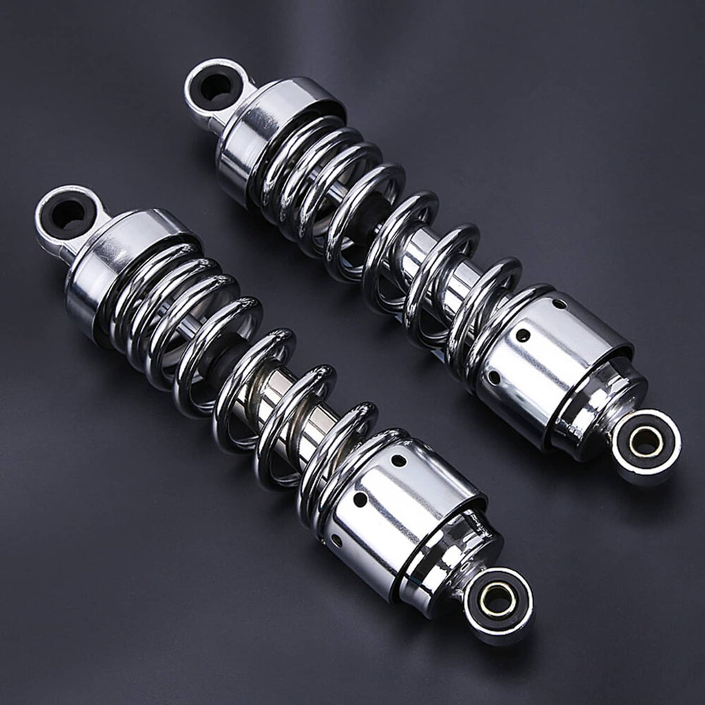 Pair of chrome shock absorbers with black coil springs and top eye brackets.