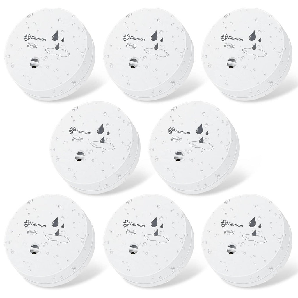 White round water leak detector alarm with sensor ports and droplet indicator icons