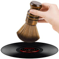 Brown anti-static vinyl record cleaning brush with dense soft bristles and wooden handle