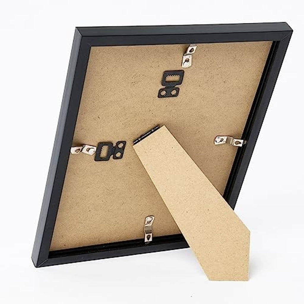 Black 8x12 picture frame back with wooden board, clips, and folding tabletop stand