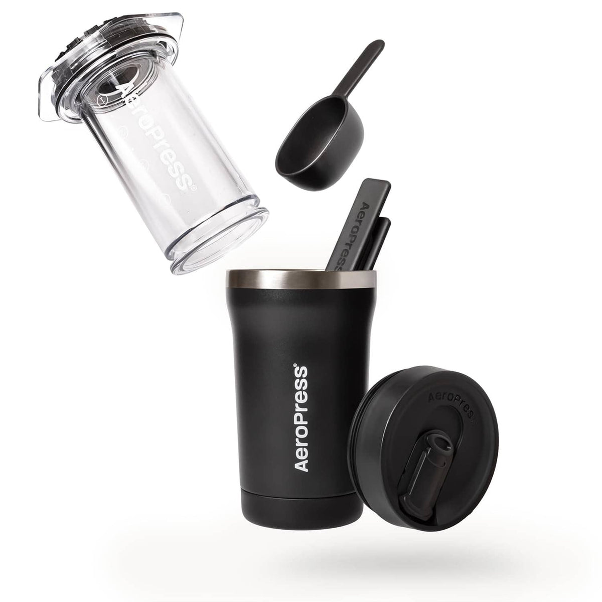 AeroPress Go Plus coffee maker with clear cylinder, black body, and plastic scoop.