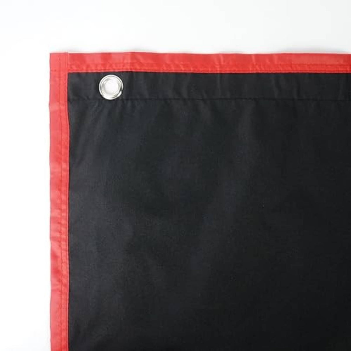 Strike zone training backdrop, red-edged black fabric with silver eyelets and white rectangle frame