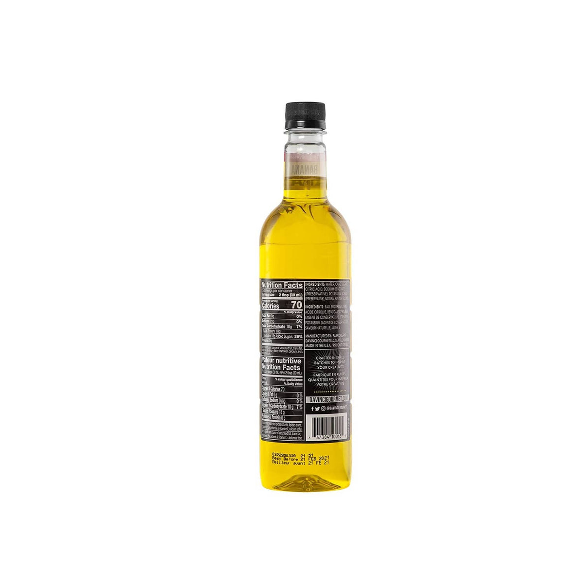 Banana syrup bottle with back label facing, yellow liquid