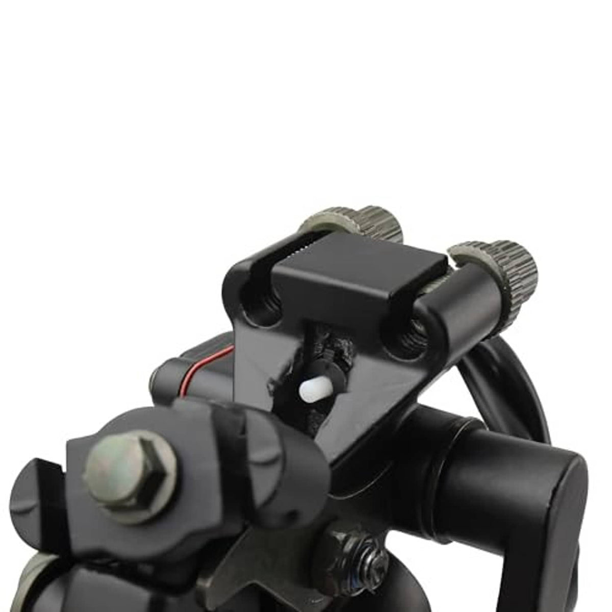 Close-up of black thumb throttle housing with adjustment parts and cables