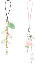 Pair of phone charm lanyards with green leaf, white beads, and gold flower accents