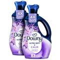 Downy Ultra Soft fabric softener liquid bottles with navy-blue and purple floral labels