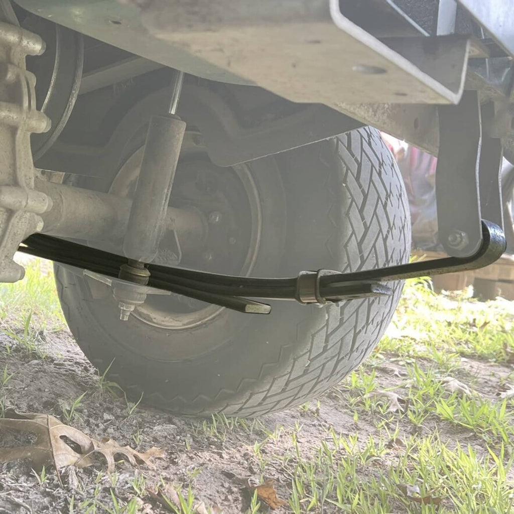Rear leaf spring installed under golf cart frame, showing black spring pack