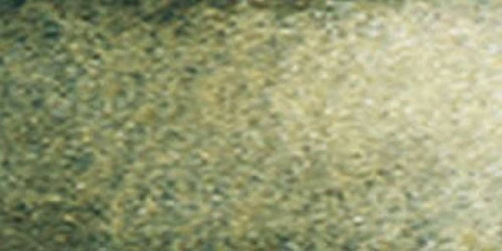 Green watercolor wash texture with speckled paper grain close-up