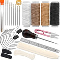 Book binding kit with bone folder, needles, clips, ruler, and wax thread spools