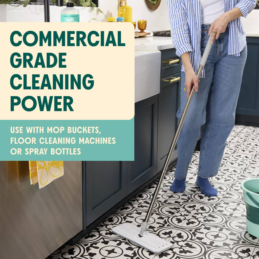 Commercial grade floor cleaner use with mop on patterned tile flooring