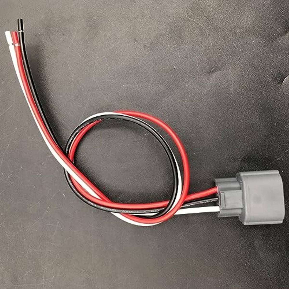 Connector pigtail harness with grey plug and red and black insulated wires
