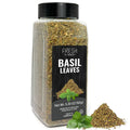 Dried basil leaves spice in clear jar with black cap and Fresh Finest Basil Leaves label