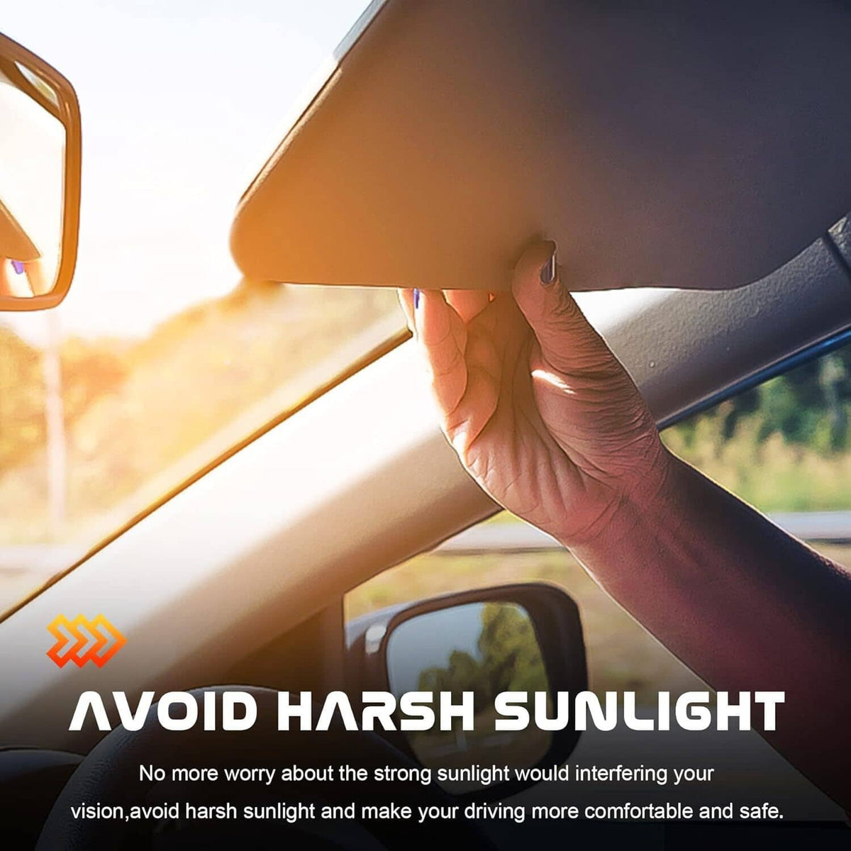 Gray sun visor adjusted down in car to help reduce glare