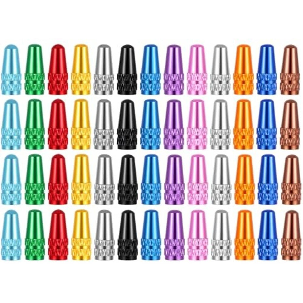 Assorted aluminum Presta valve caps set with many colorful caps arranged in rows