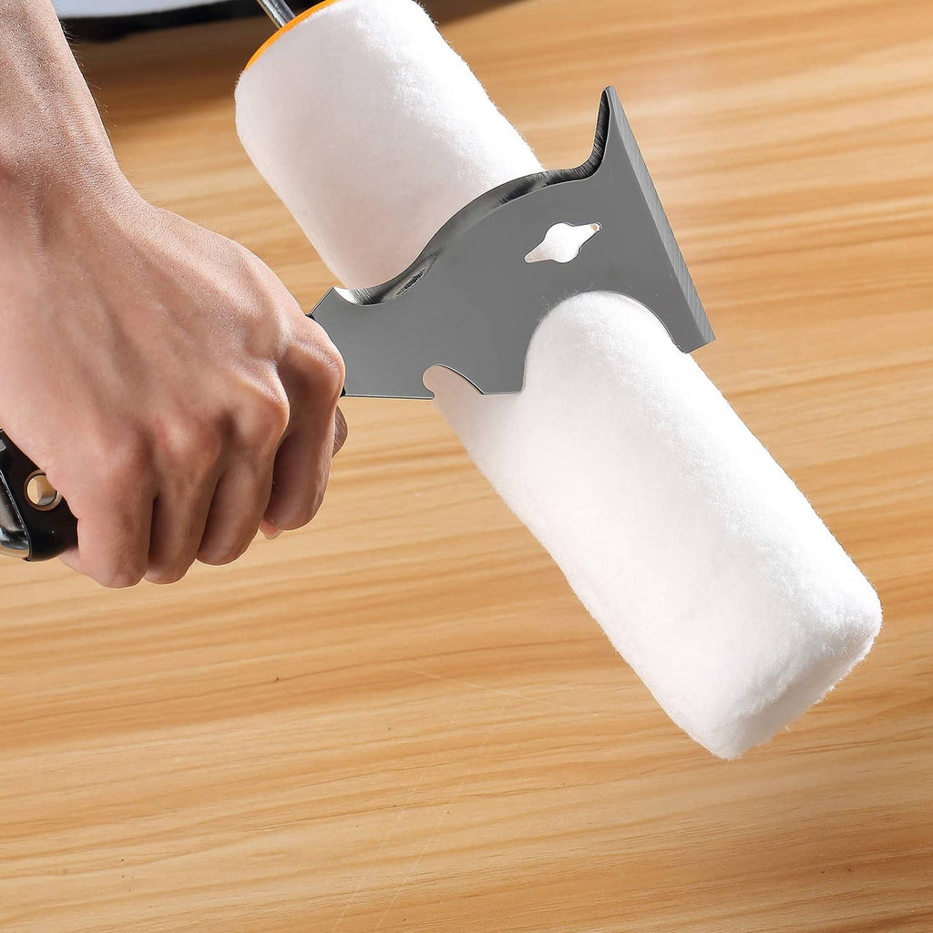 Paint scraper blade used on a paint roller, with black handle