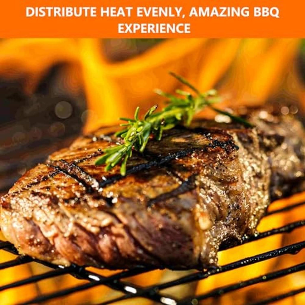 Stainless steel grill grates with cooked meat on top over open flame