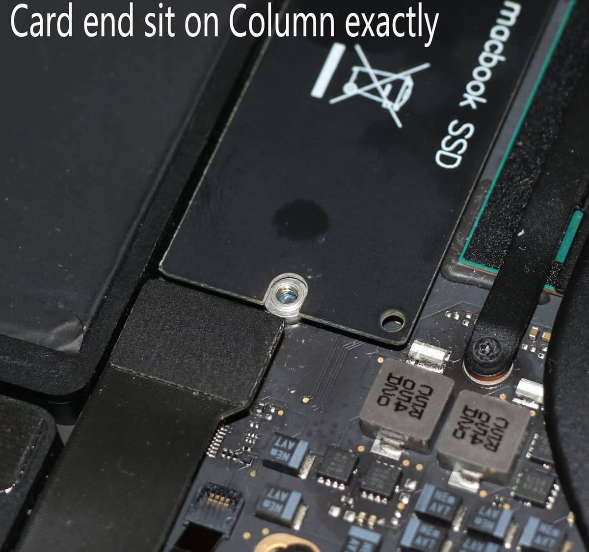 Black M.2 NGFF nVME adapter card close-up of components and mounting screw