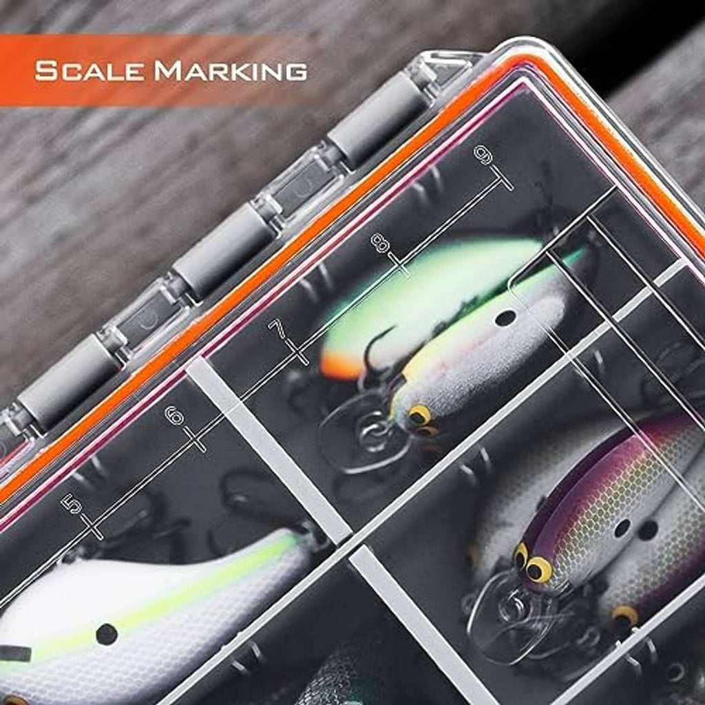 Close-up of tackle box lid showing scale markings over clear compartment grid