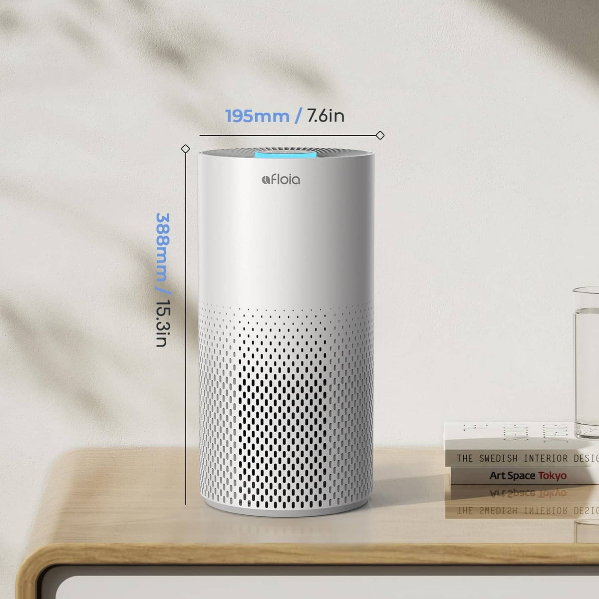White air purifier cylinder with blue LED top and vent holes, with size guide