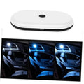 Rechargeable car ceiling LED dome light, round white housing with black rim and USB port
