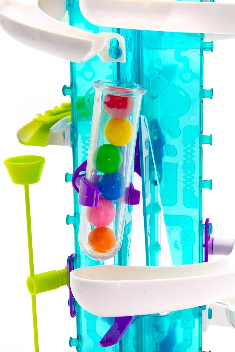 Gumball machine tube holding multiple colored balls with white circular base.