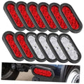 Set of oval LED trailer lights with red and clear lenses, black housings