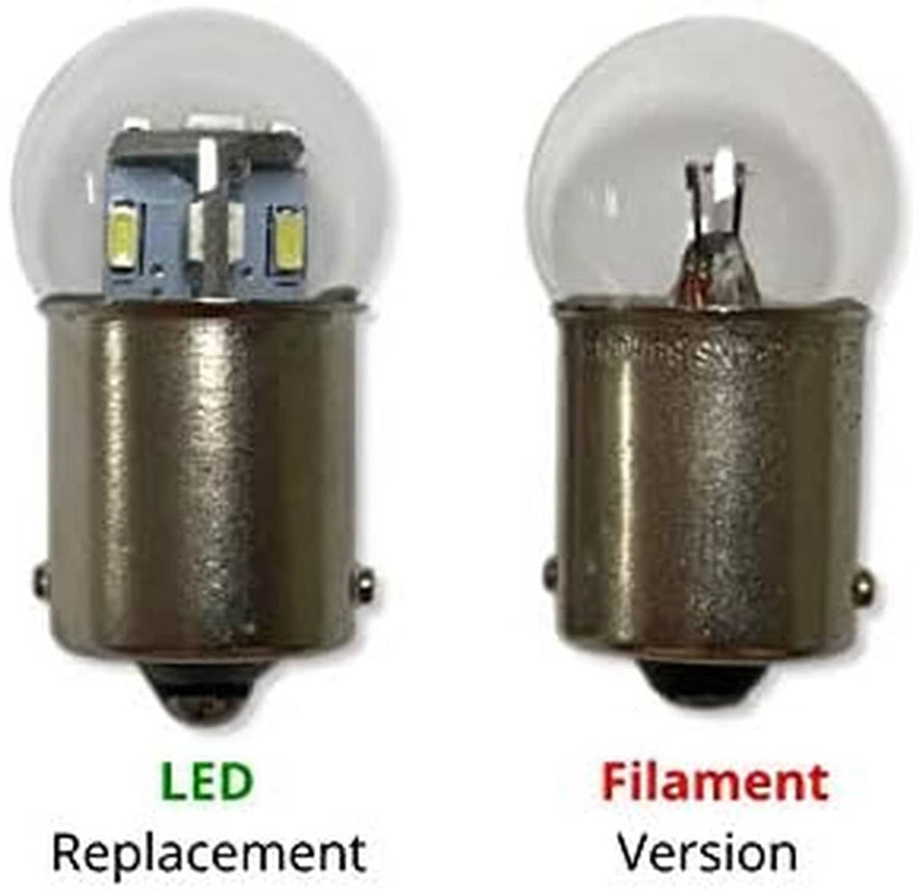 Two small miniature bulbs with clear domes and silver metal bases