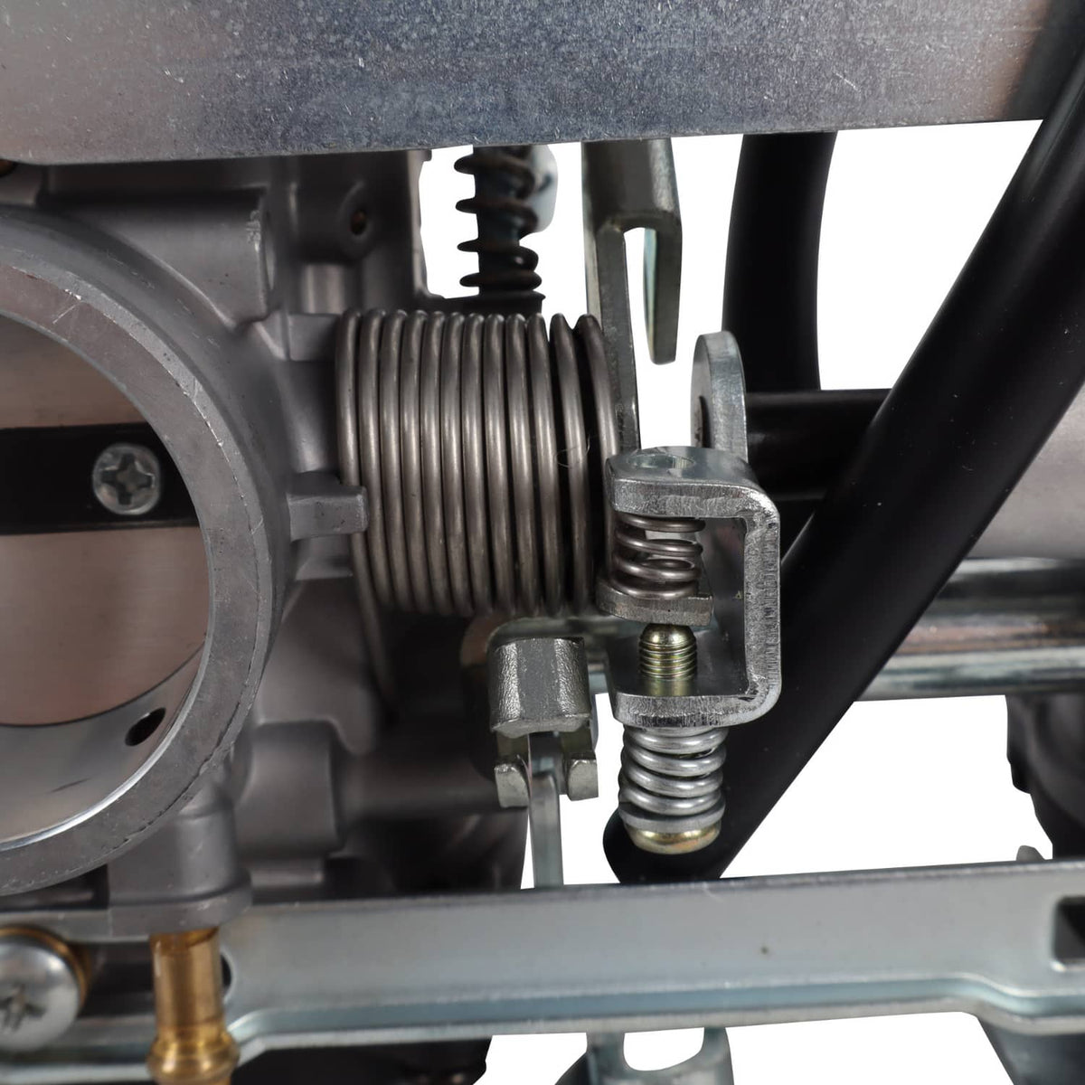 Motorcycle carburetor spring linkage and fuel line fitting
