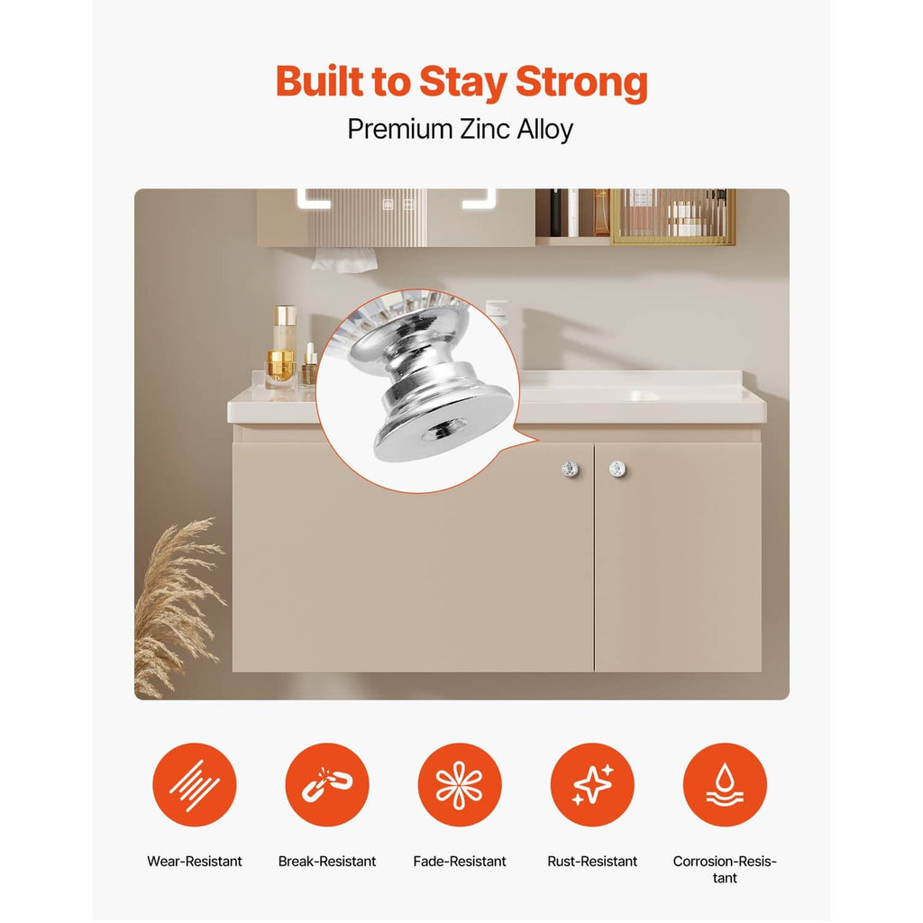 Chrome and clear acrylic diamond knobs on a cabinet door in kitchen setting.