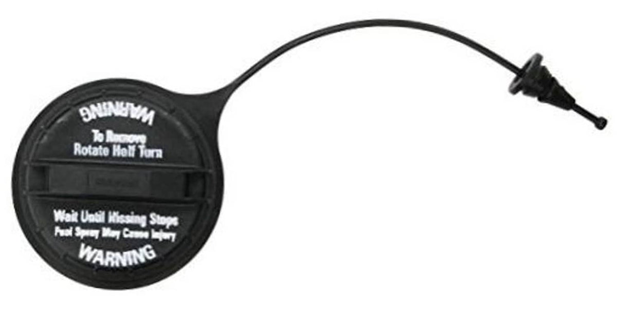 Motorcraft fuel cap with tether line and warning text on black round cover
