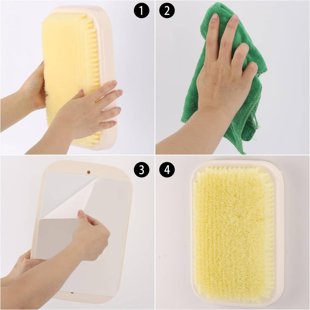 Wall-mounted back scrubber with yellow pad; hands show mounting and scrubbing with towel