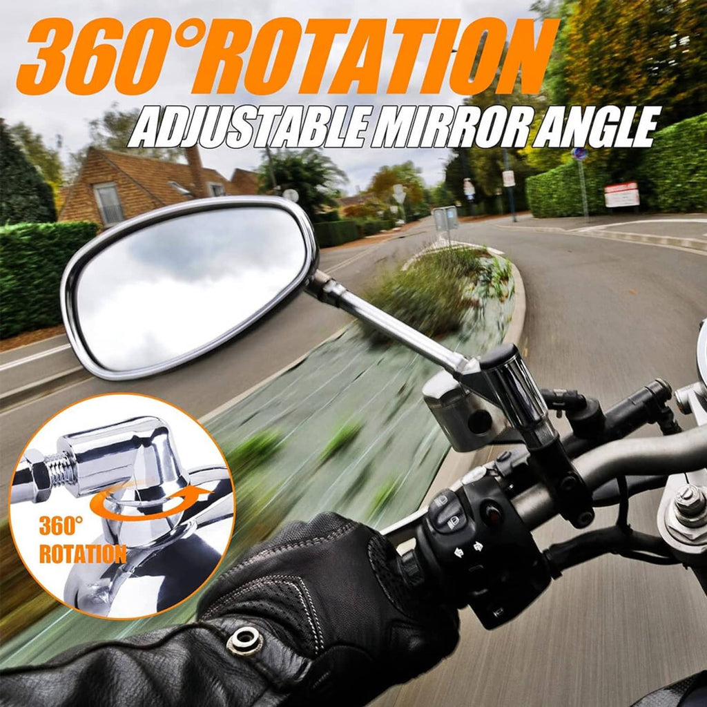 Oval chrome motorcycle mirror mounted to handlebar with adjustable arm