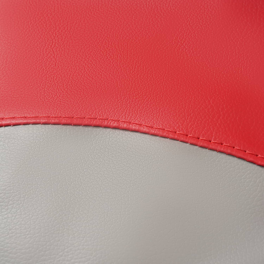 Close-up of red and gray seat cover seam with stitched border