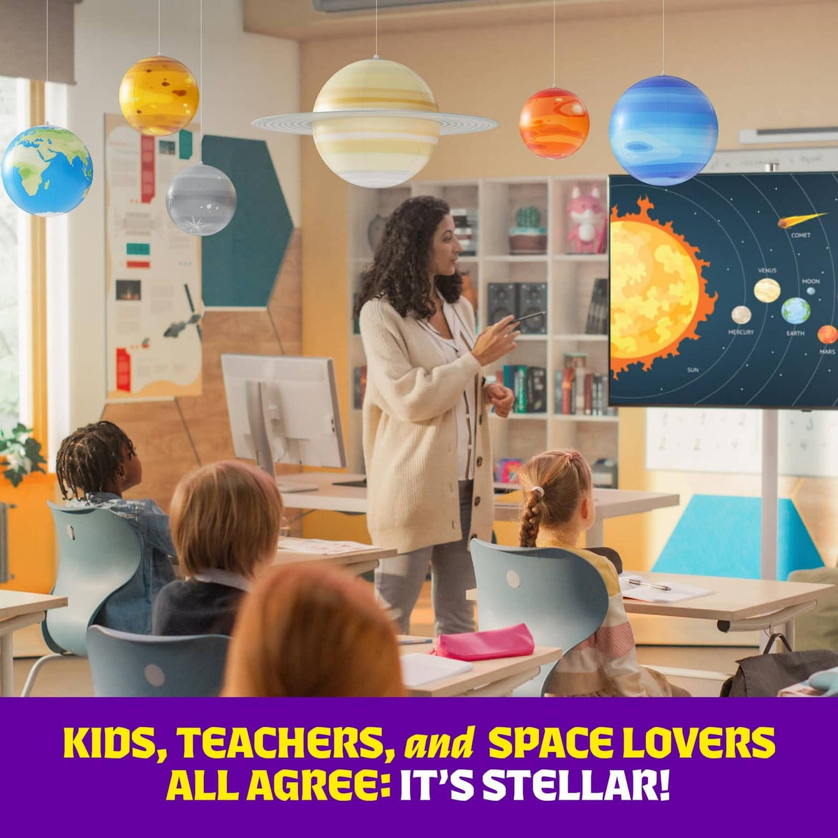 Inflatable solar system planet set with multiple hanging planets in a classroom