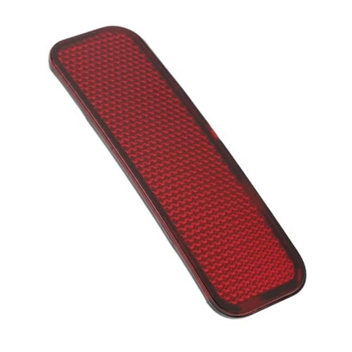 Red rear bumper reflector lens with grid texture and dark trim, tilted rectangular