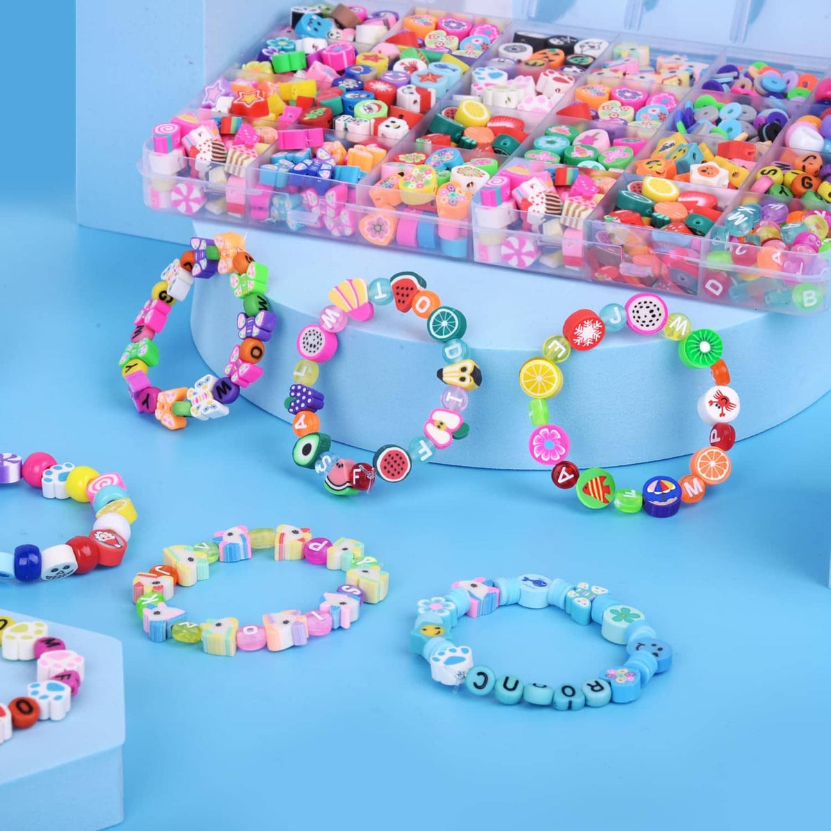 Colorful polymer clay bead bracelets with alphabet and fruit style charm beads