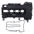 Black camshaft valve cover with gasket set, showing mounting holes and outlets