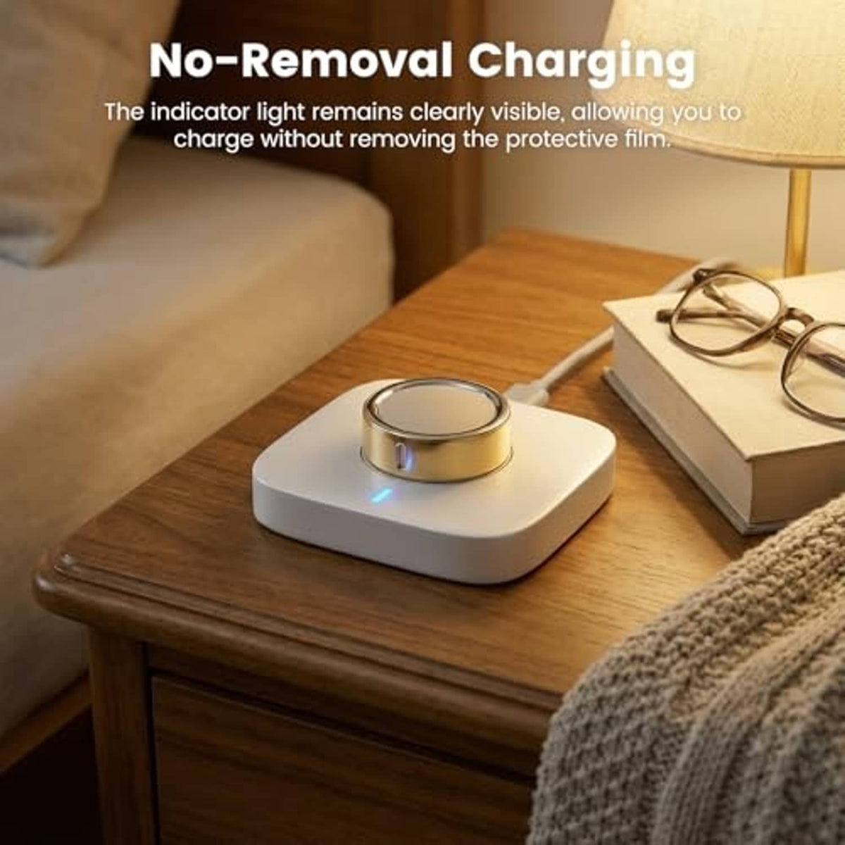 Ultra-thin transparent protector film for Oura Ring on charging dock with ring in place