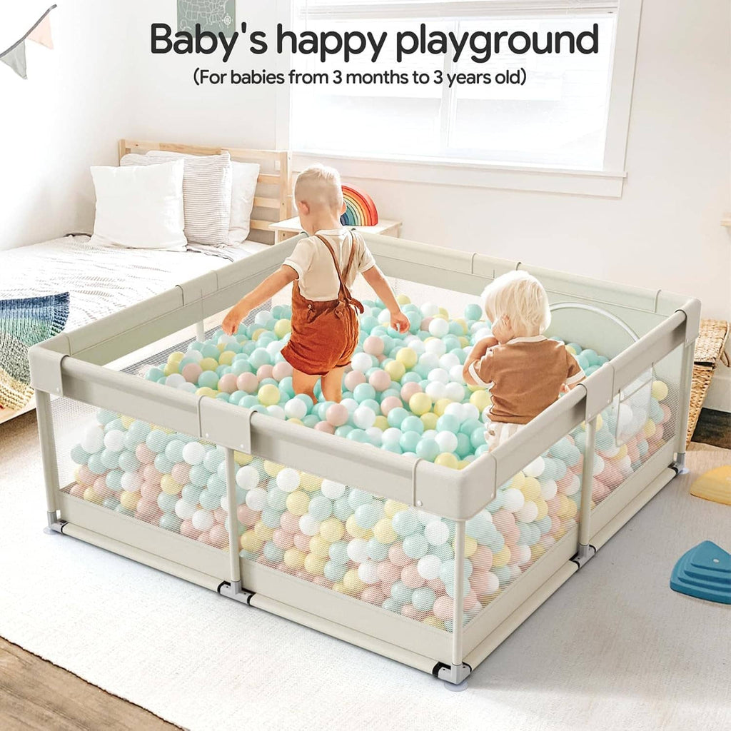 Beige baby playpen with mesh walls and ball pit, toddlers standing and playing inside
