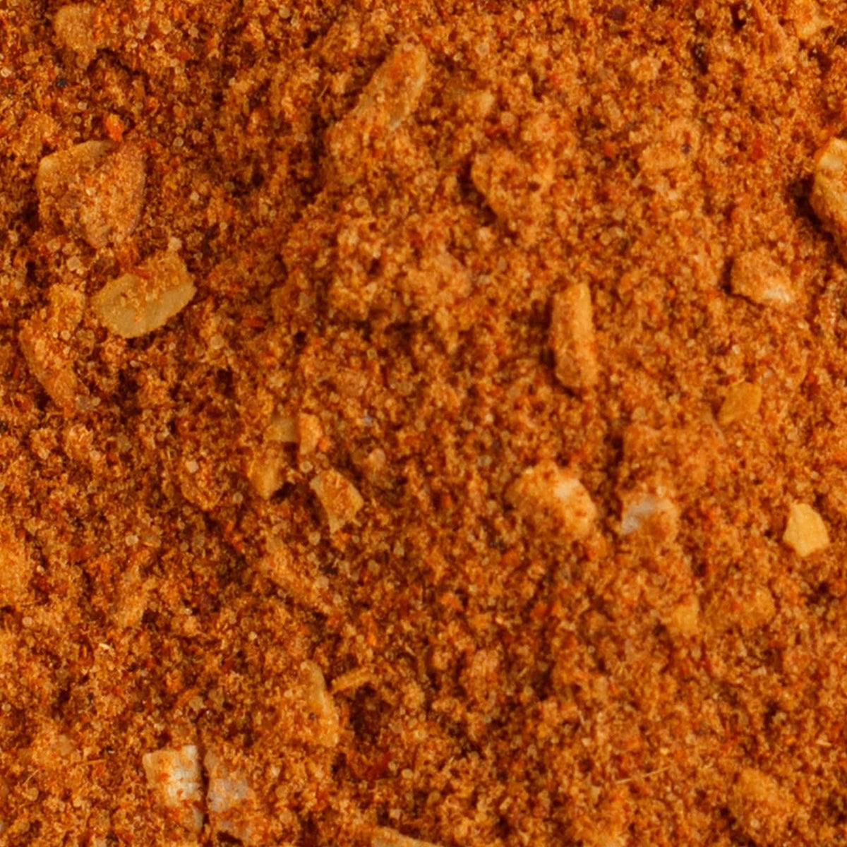Orange-brown taco seasoning mix powder texture