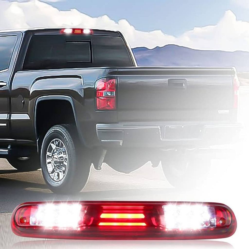 LED tail light assembly with red lens and clear LED strip lights, mounted on vehicle rear