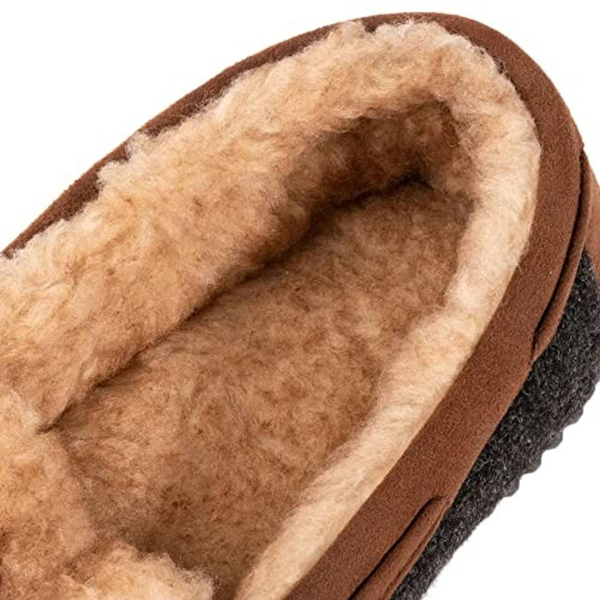 Men's moc slipper close-up: tan fleece lining inside with brown trim