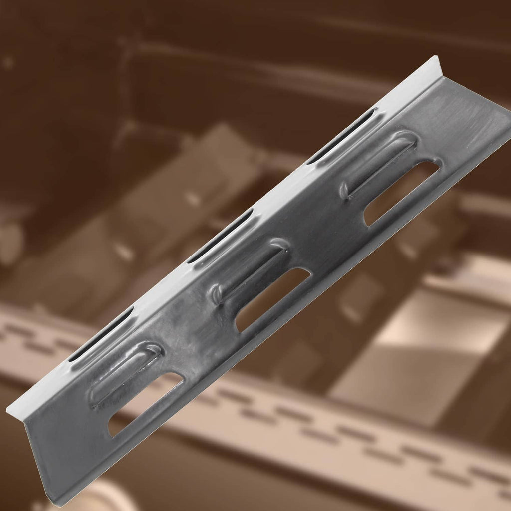 BBQ grill heat plate replacement, angled view of dark steel bar with cutout slots